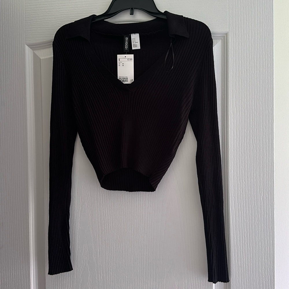 Black V-neck, ribbed, collar sweater/blouse